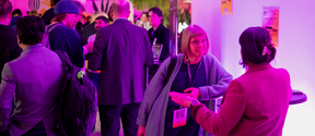 Attendees networking at Demo Day